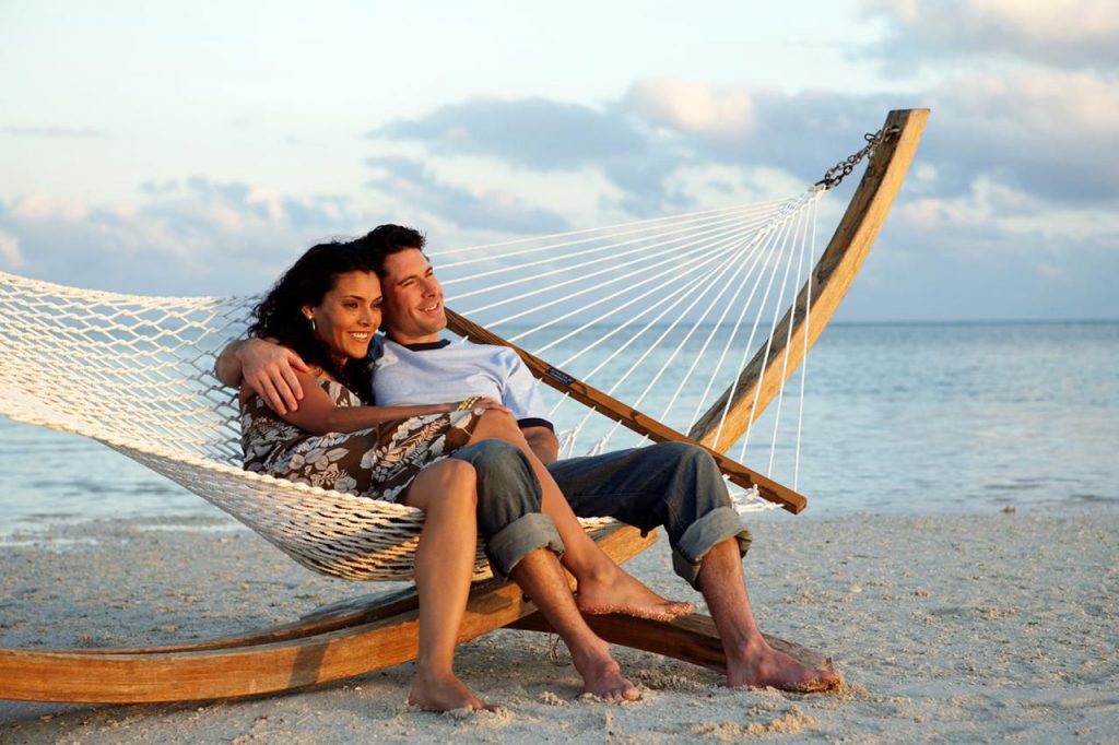 couple in hammock on beach